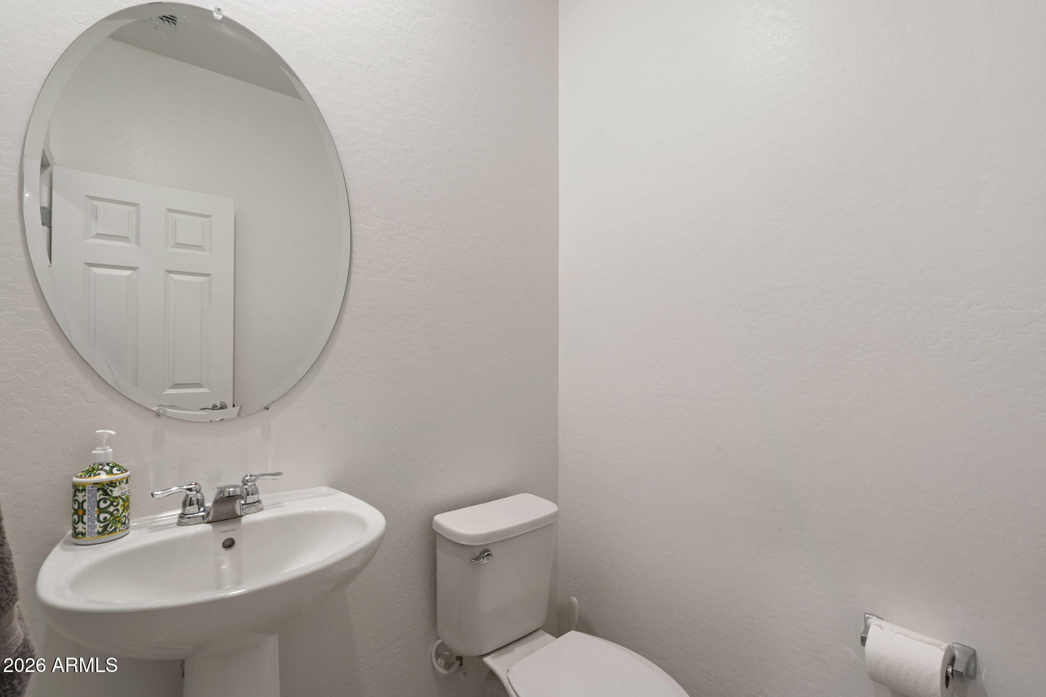 3142 Pineapple Road San Tan Valley, AZ 85143 - Photo 17 of 21 a bathroom with a sink mirror and toilet