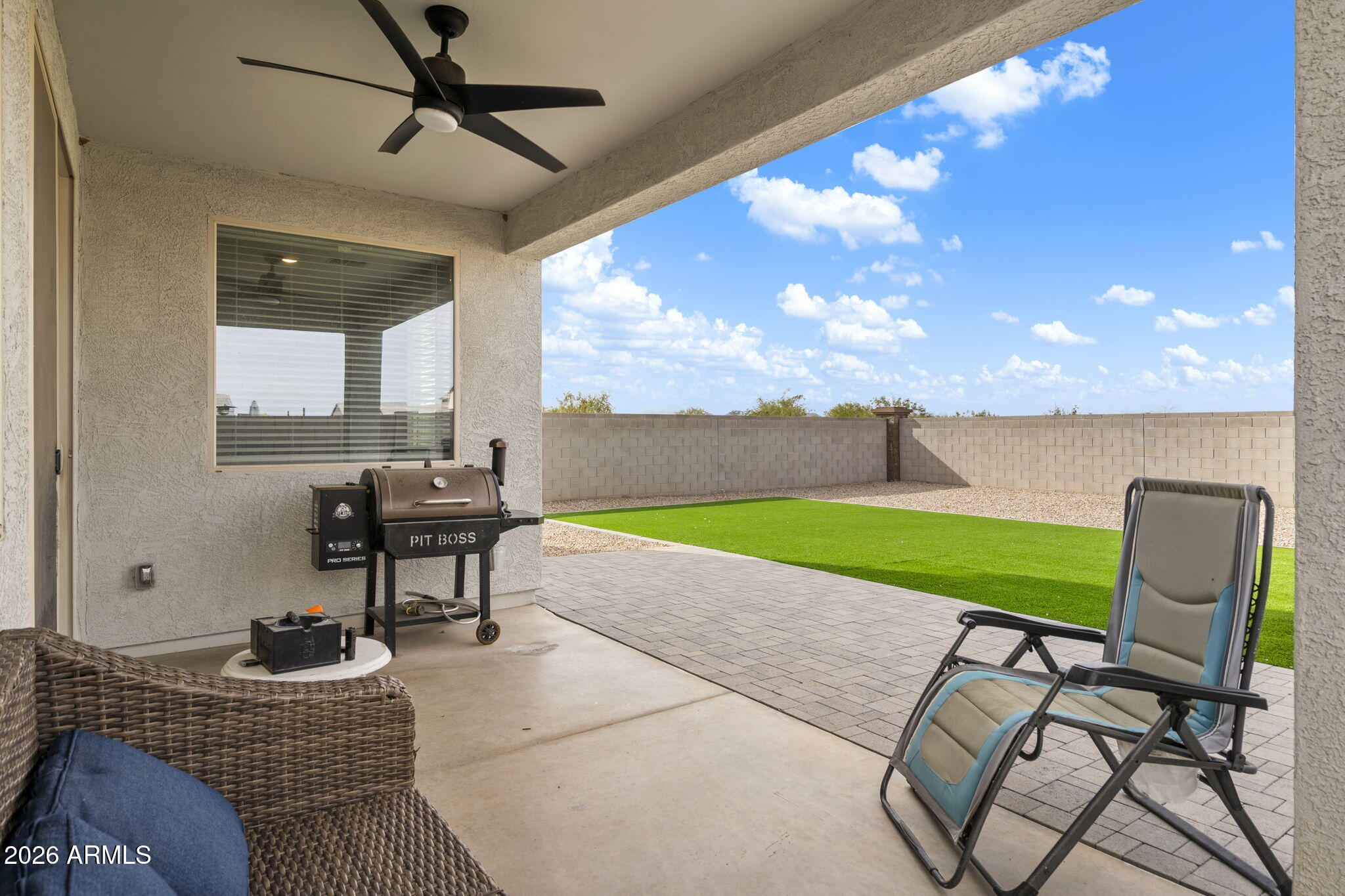 3142 Pineapple Road San Tan Valley, AZ 85143 - Photo 18 of 21 a living room with furniture and a large window