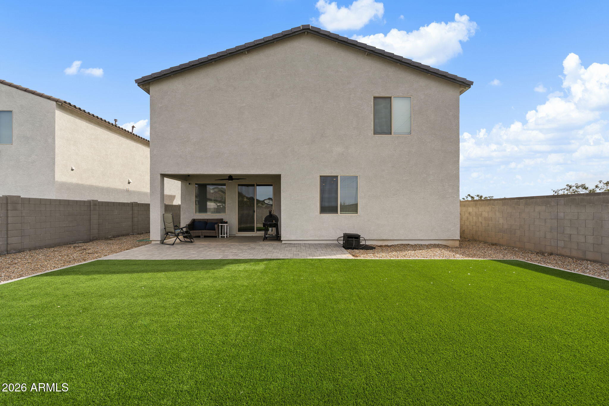 3142 Pineapple Road San Tan Valley, AZ 85143 - Photo 20 of 21 a view of a house with a yard and a patio
