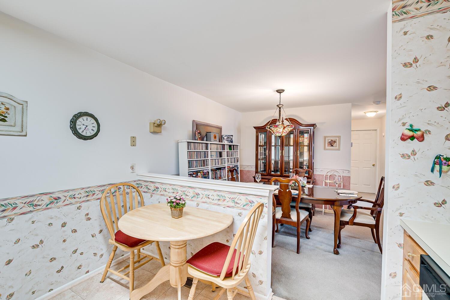 340 Bowler Court Piscataway, NJ 08854 - Photo 14 of 23 a view of a dining room with furniture and chandelier