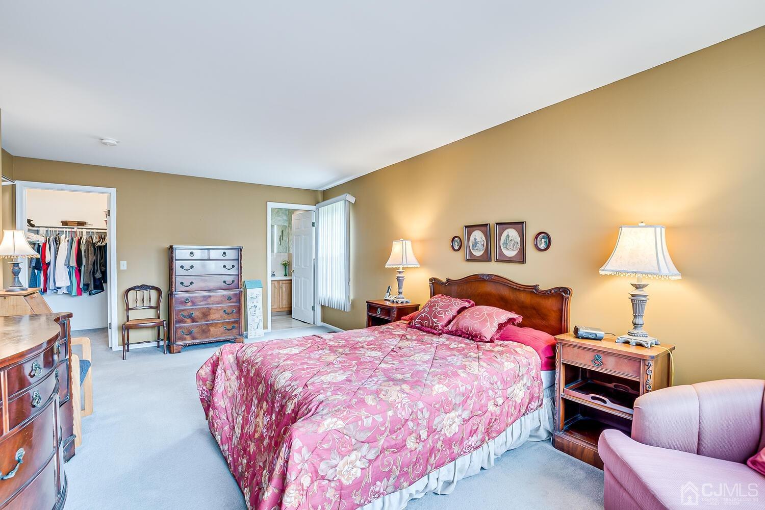 340 Bowler Court Piscataway, NJ 08854 - Photo 16 of 23 a bedroom with a bed and a couch