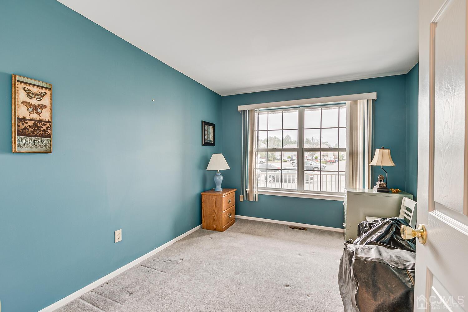 340 Bowler Court Piscataway, NJ 08854 - Photo 19 of 23 a room with furniture and a window