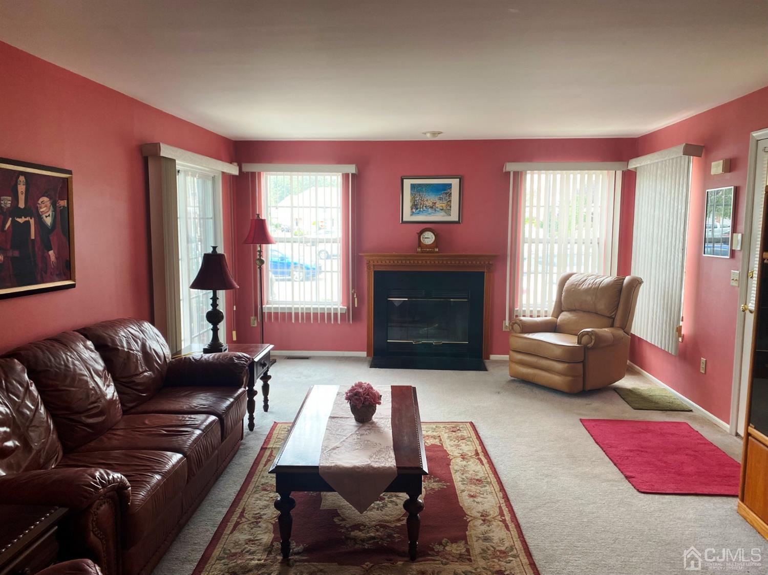 340 Bowler Court Piscataway, NJ 08854 - Photo 3 of 23 a living room with furniture and a fireplace