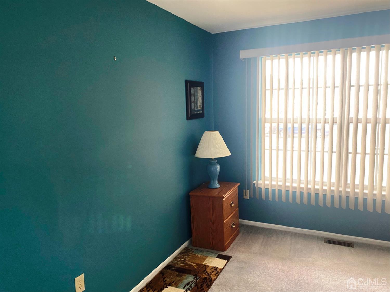 340 Bowler Court Piscataway, NJ 08854 - Photo 7 of 23 a workspace with furniture and a window