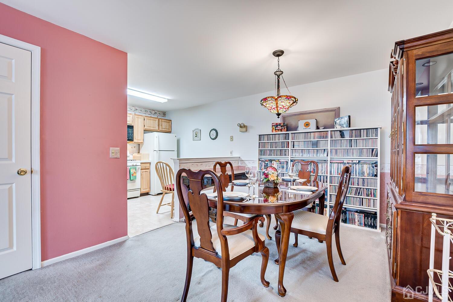 340 Bowler Court Piscataway, NJ 08854 - Photo 9 of 23 a dining room with furniture and window