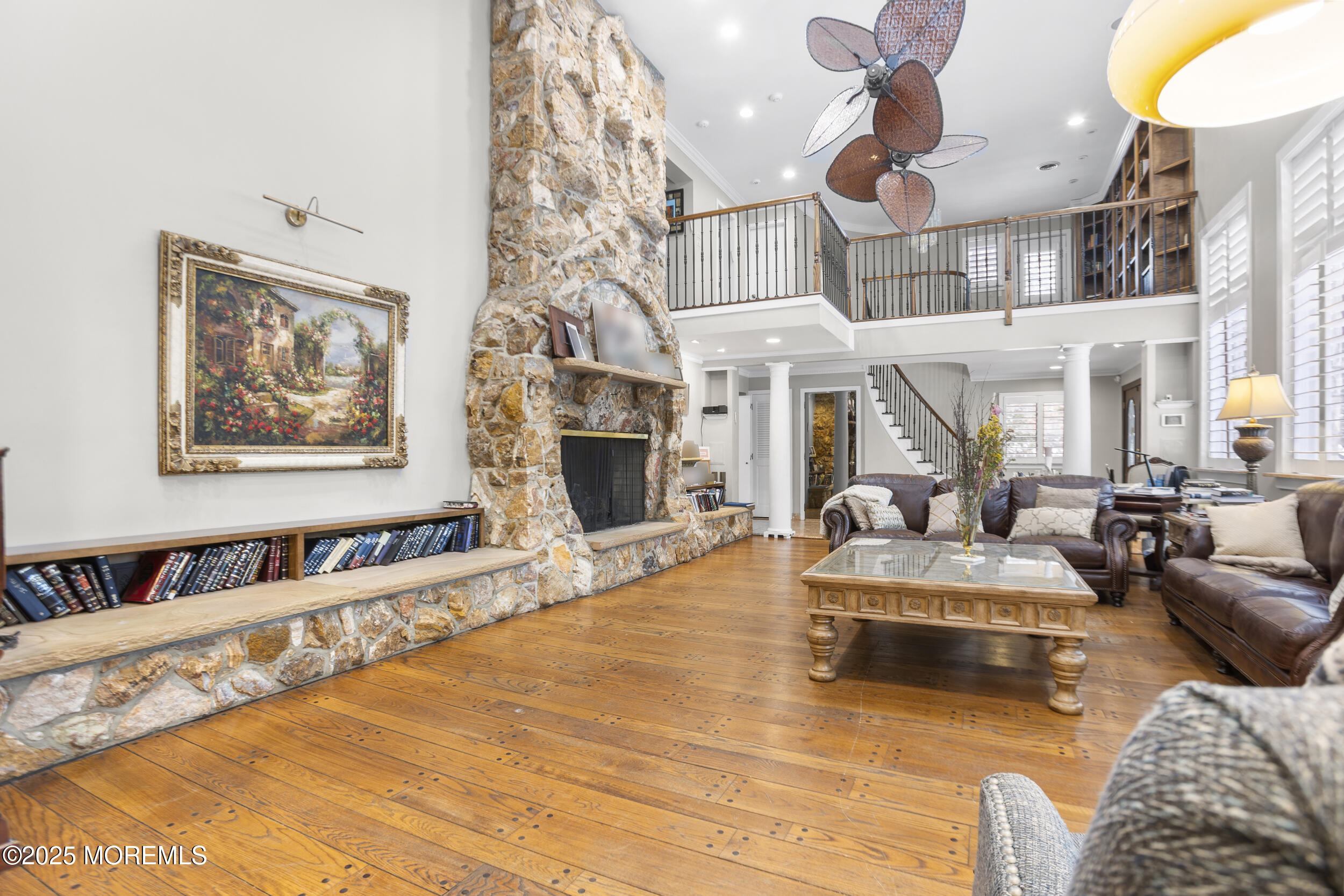 780 Green Valley Road Jackson, NJ 08527 - Photo 12 of 44 a living room with furniture or couch and a fireplace