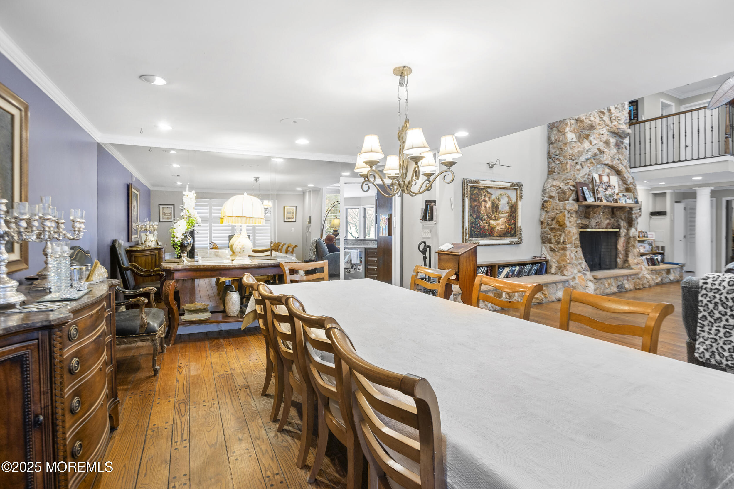 780 Green Valley Road Jackson, NJ 08527 - Photo 14 of 44 a dining room with furniture a kitchen and chandelier