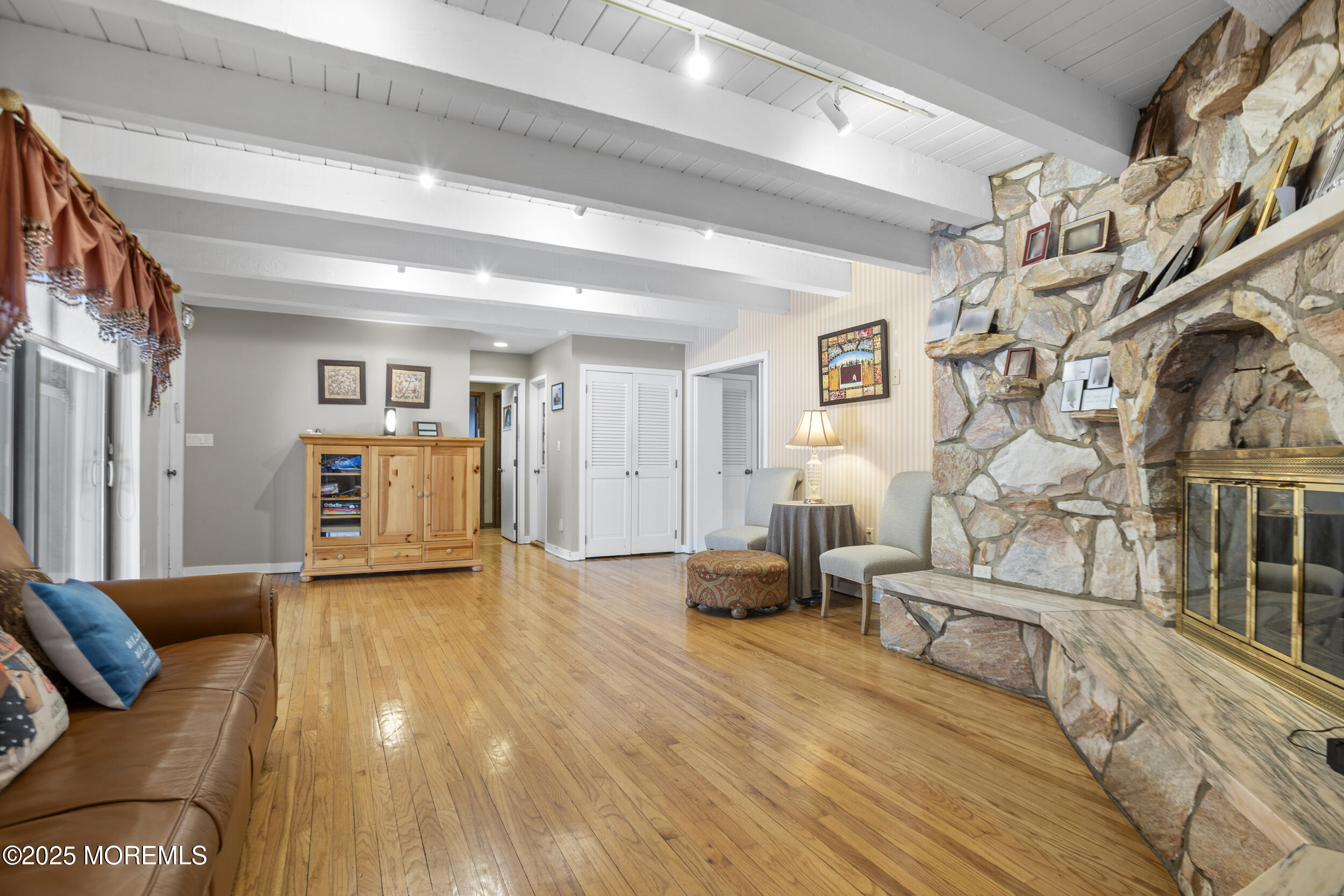 780 Green Valley Road Jackson, NJ 08527 - Photo 28 of 44 a view of livingroom with furniture and wooden floor