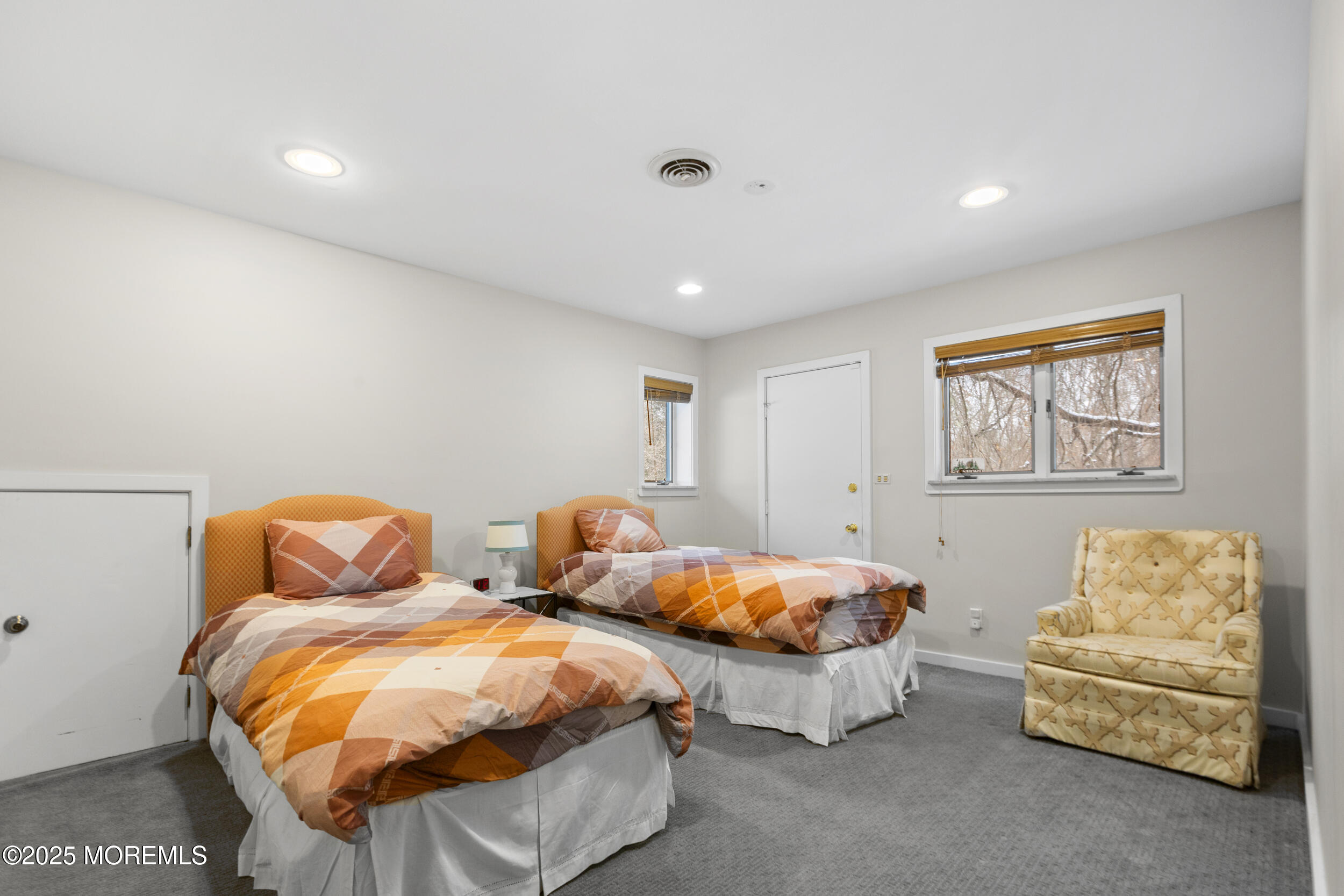 780 Green Valley Road Jackson, NJ 08527 - Photo 32 of 44 a bedroom with two beds and a couch