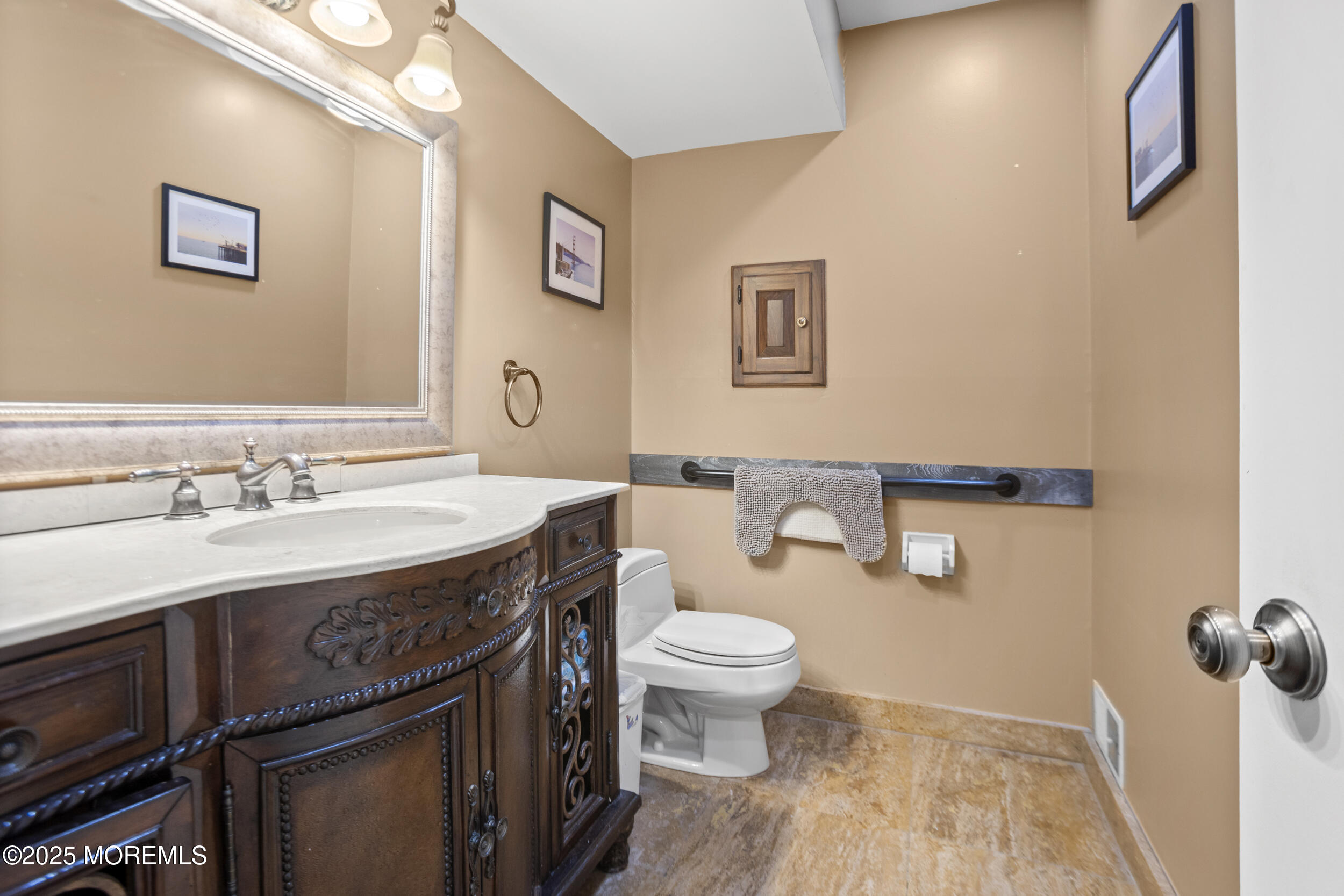 780 Green Valley Road Jackson, NJ 08527 - Photo 33 of 44 a bathroom with a sink and a mirror