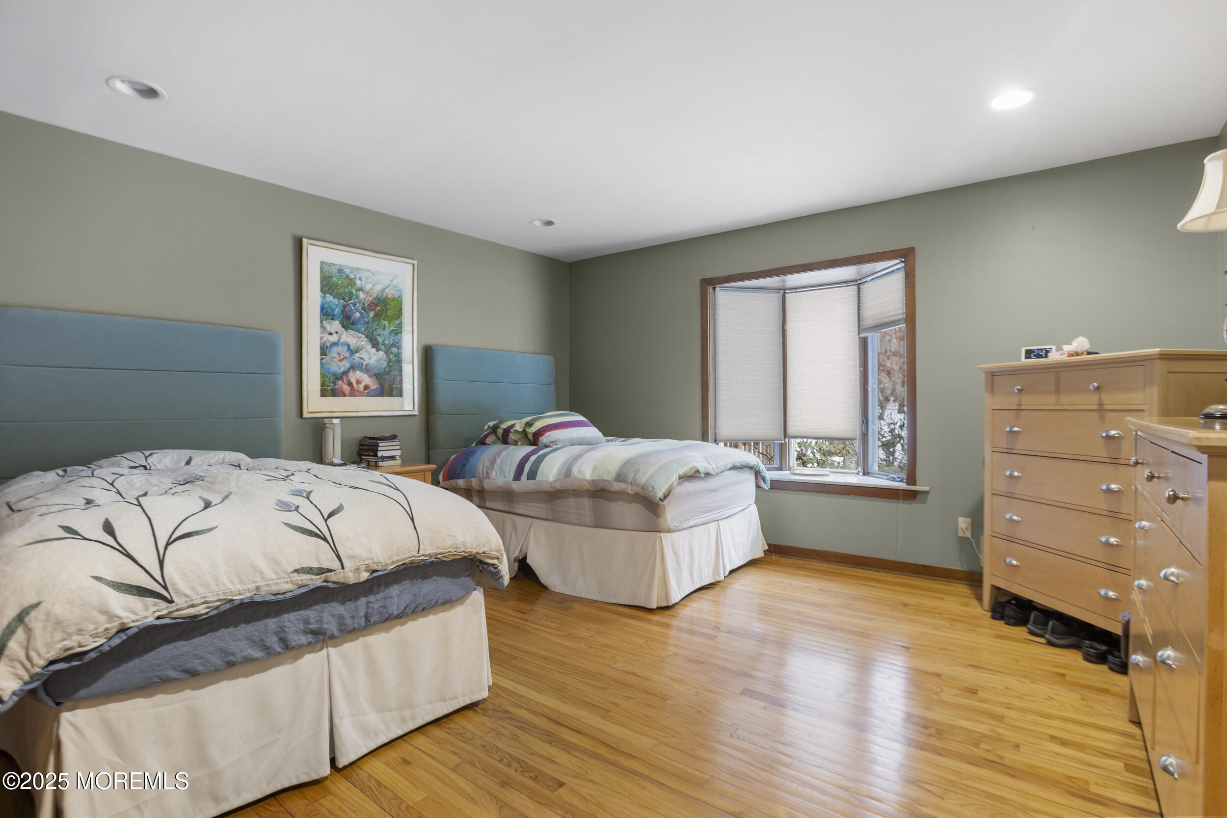 780 Green Valley Road Jackson, NJ 08527 - Photo 34 of 44 a bedroom with two beds and painting on the wall