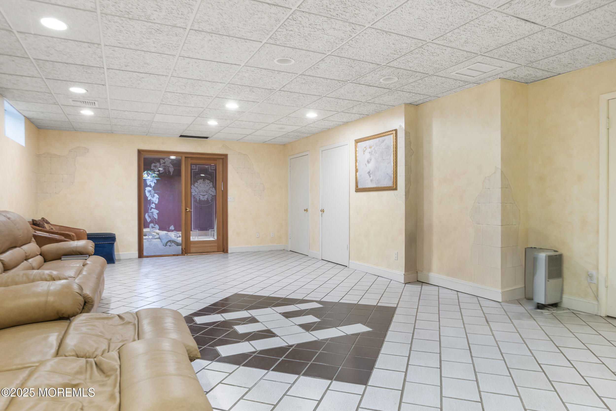 780 Green Valley Road Jackson, NJ 08527 - Photo 37 of 44 a living room with furniture and a rug