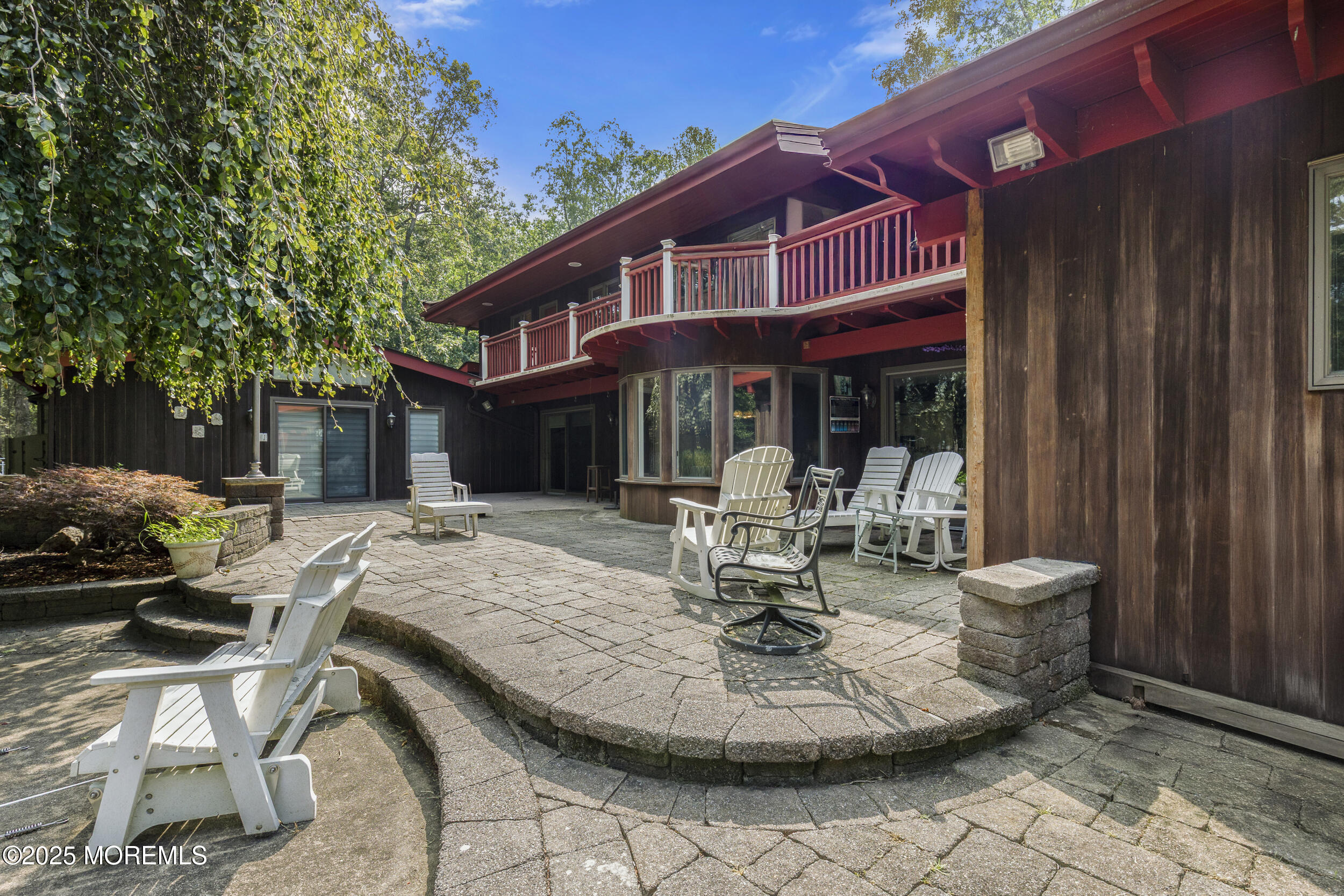 780 Green Valley Road Jackson, NJ 08527 - Photo 41 of 44 a view of a house with backyard fountain and sitting area