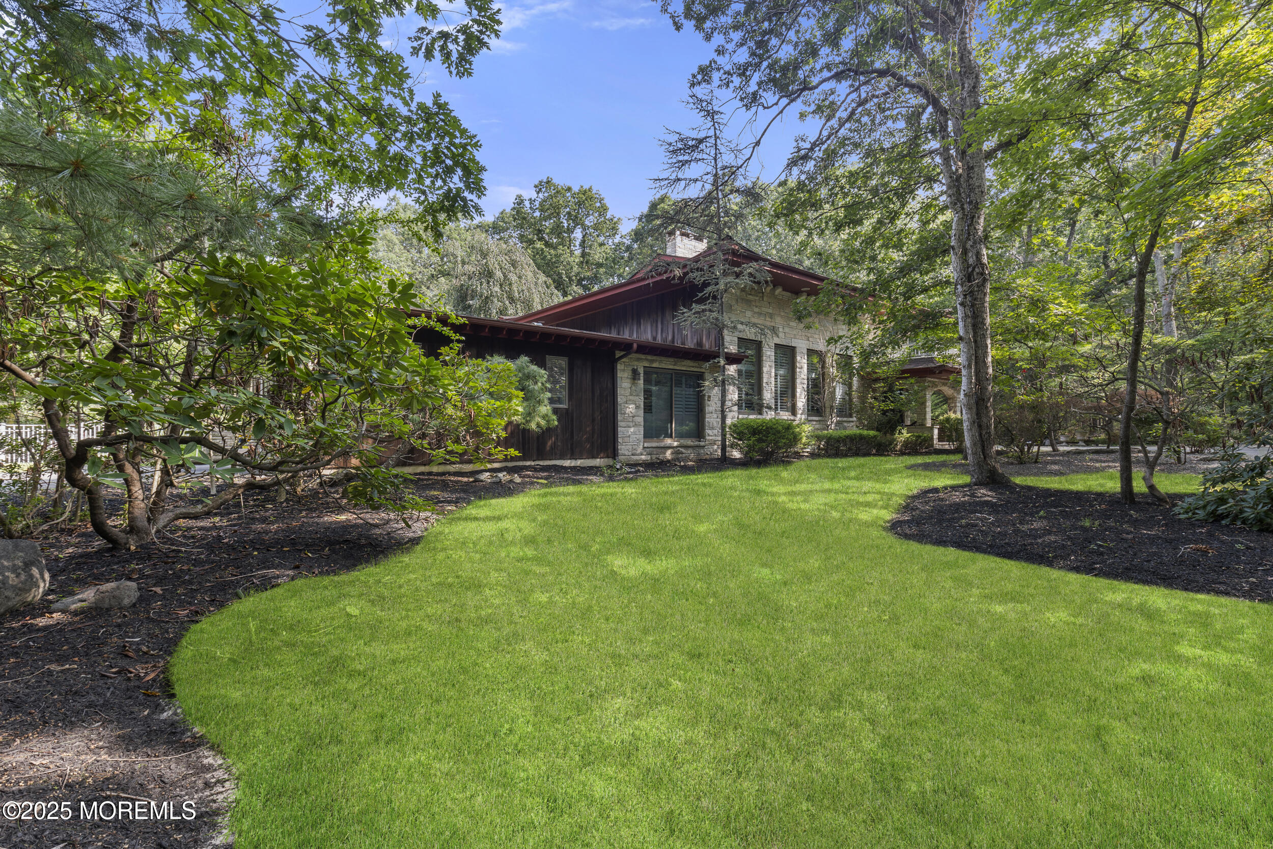 780 Green Valley Road Jackson, NJ 08527 - Photo 6 of 44 a front view of a house with a yard