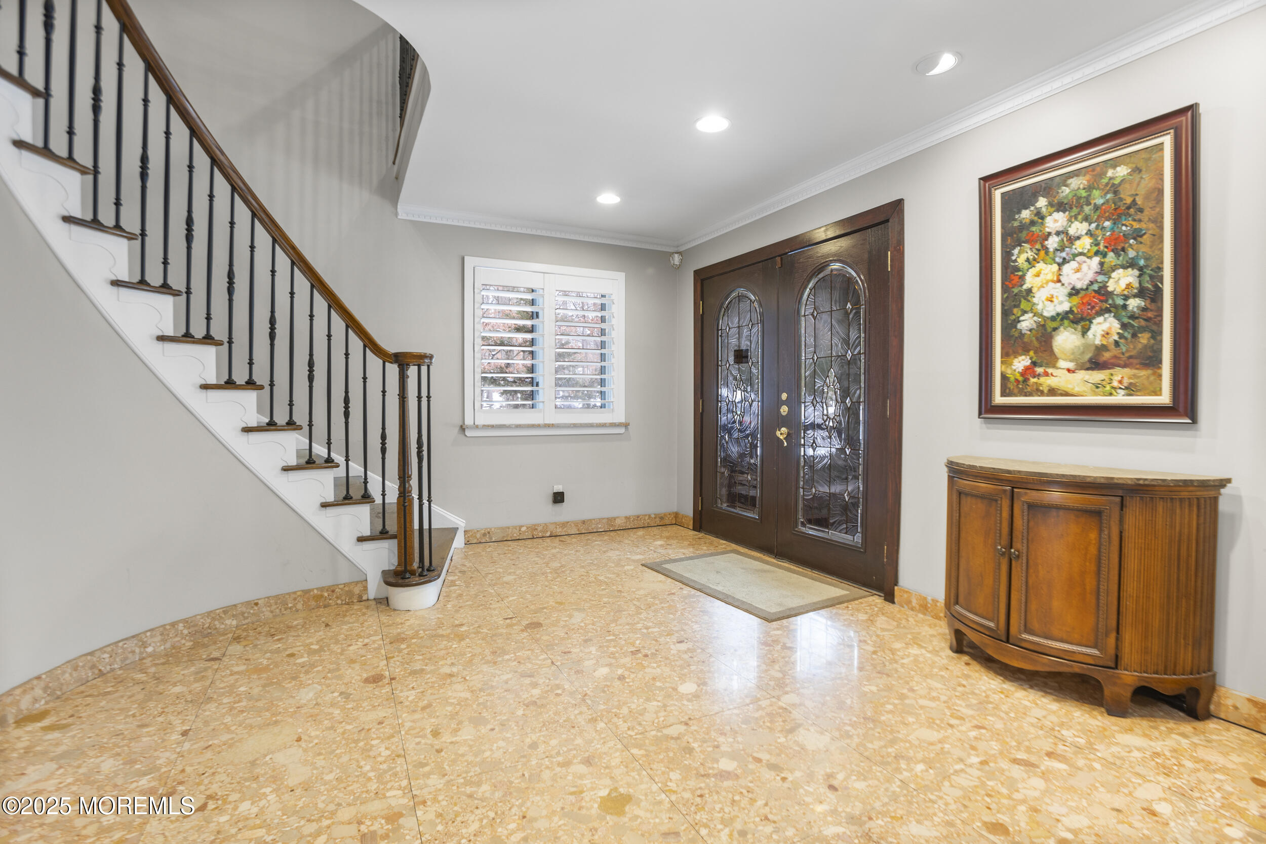 780 Green Valley Road Jackson, NJ 08527 - Photo 7 of 44 a view of an empty room with wooden floor and entryway