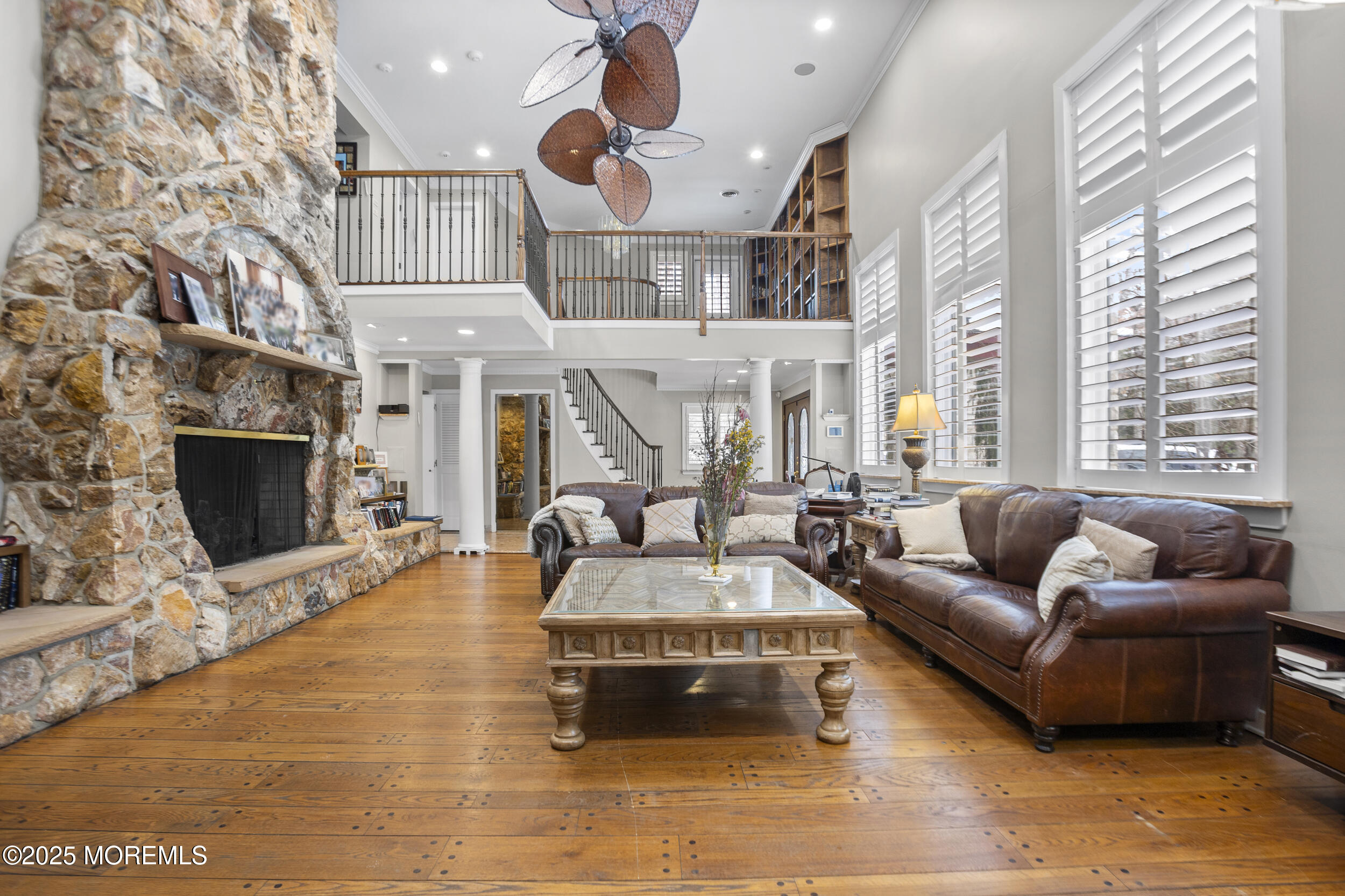 780 Green Valley Road Jackson, NJ 08527 - Photo 10 of 44 a living room with furniture and a fireplace