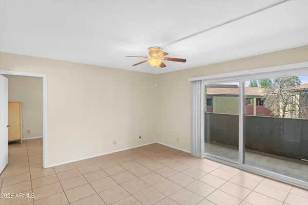 a view of an empty room and window