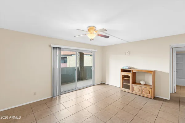 a view of an empty room and window