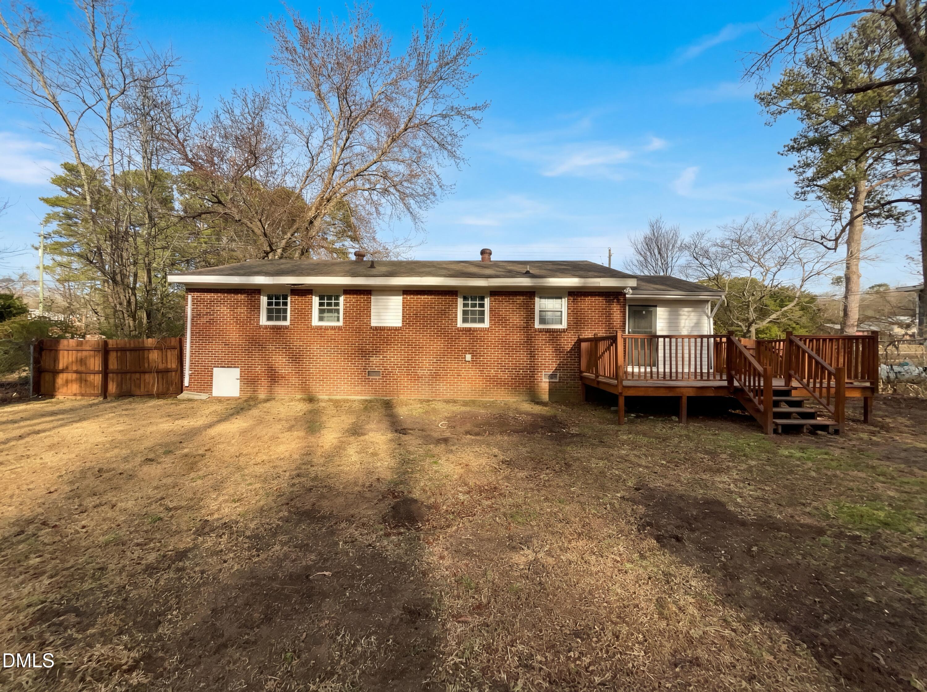6412 Rock Quarry Road Raleigh, NC 27610 - Photo 17 of 17 a view of a house with backyard