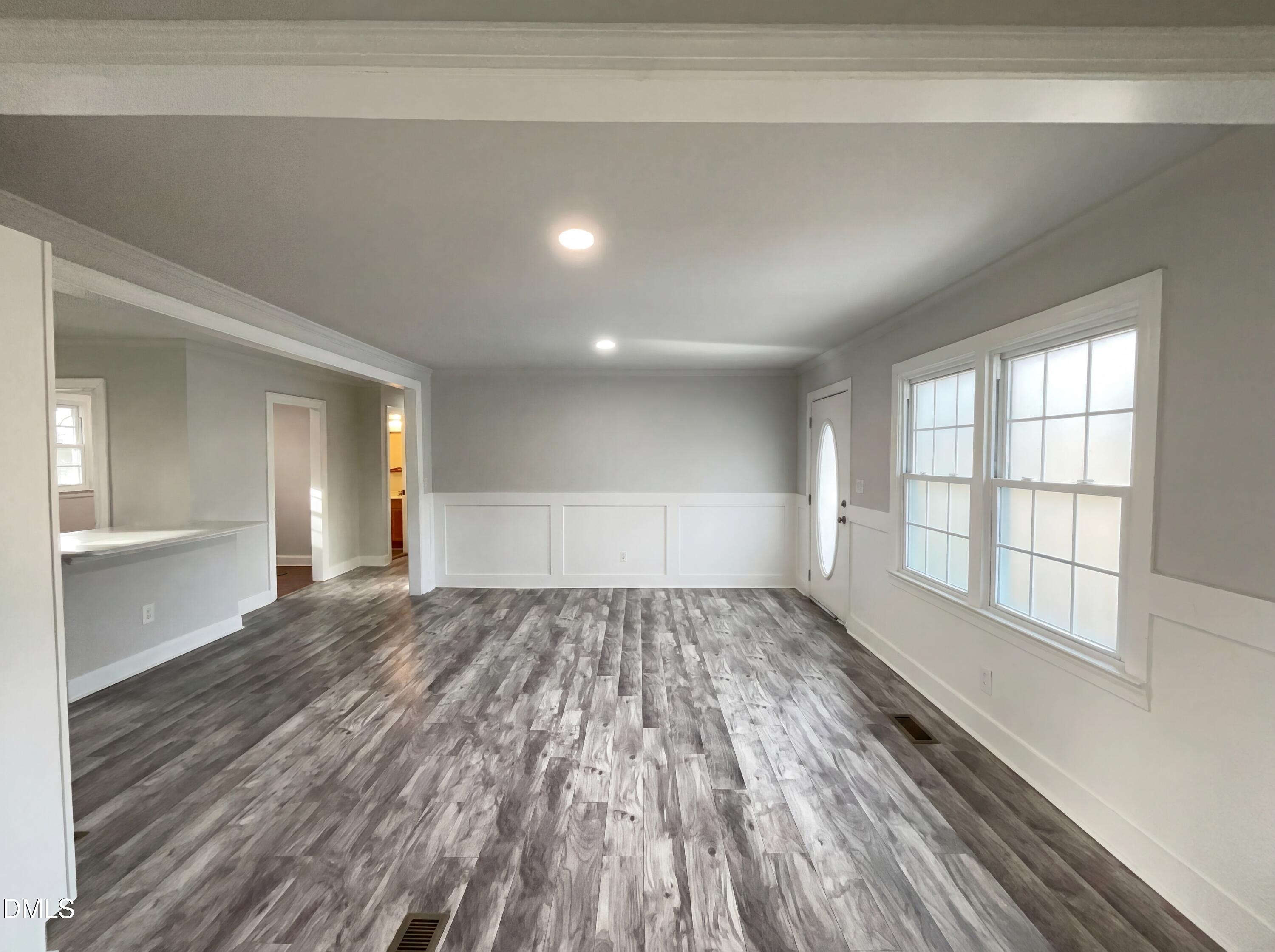 6412 Rock Quarry Road Raleigh, NC 27610 - Photo 3 of 17 a view of an empty room and window