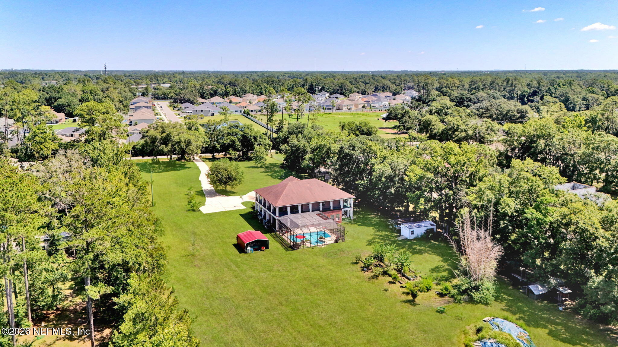 5052 Lourcey Road Jacksonville, FL 32257 - Photo 69 of 75 15-web-or-mls-DJI_20260624231537_0026