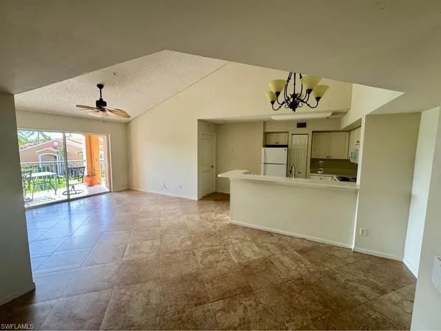 a view of a bathroom with a sink and mirror