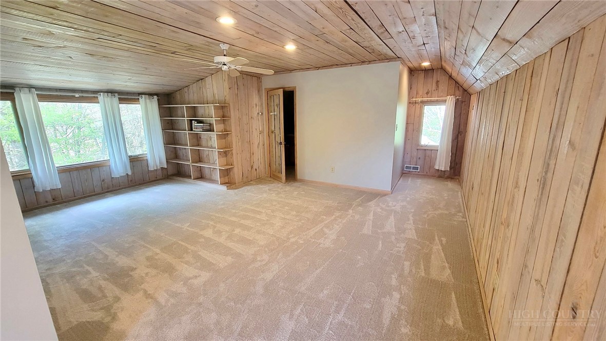 172 Yarrow Lane Boone, NC 28607 - Photo 17 of 30 a view of a livingroom with an empty space and a window