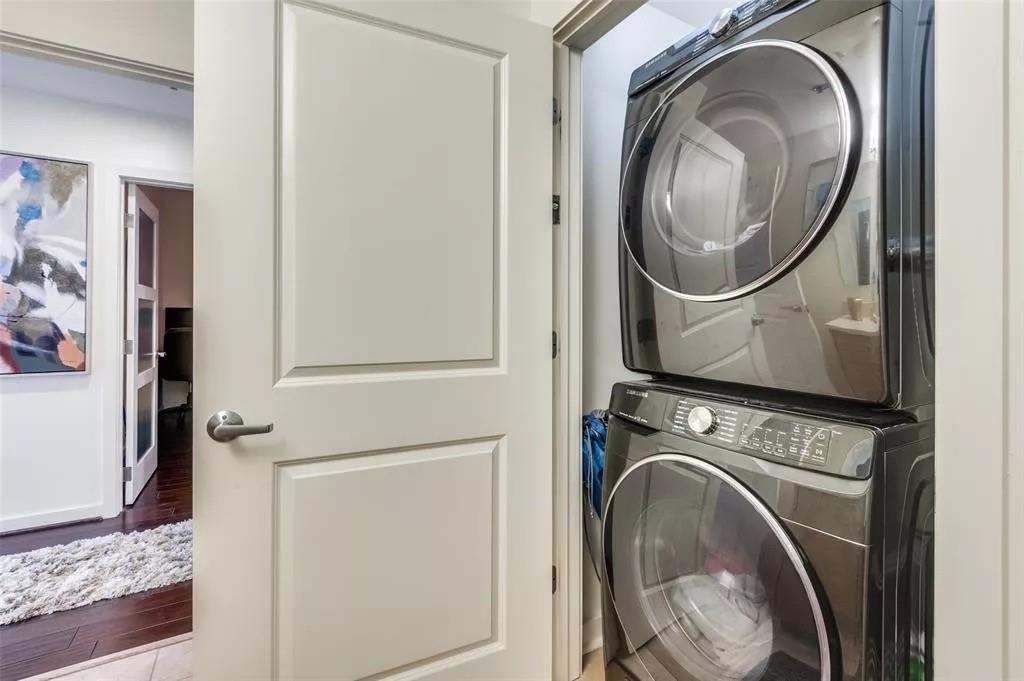 1200 Main Street, Unit 1404 Dallas, TX 75202 - Photo 12 of 27 a utility room with dryer and washer