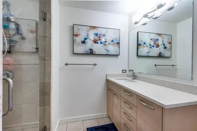a bathroom with a toilet a sink and bathtub