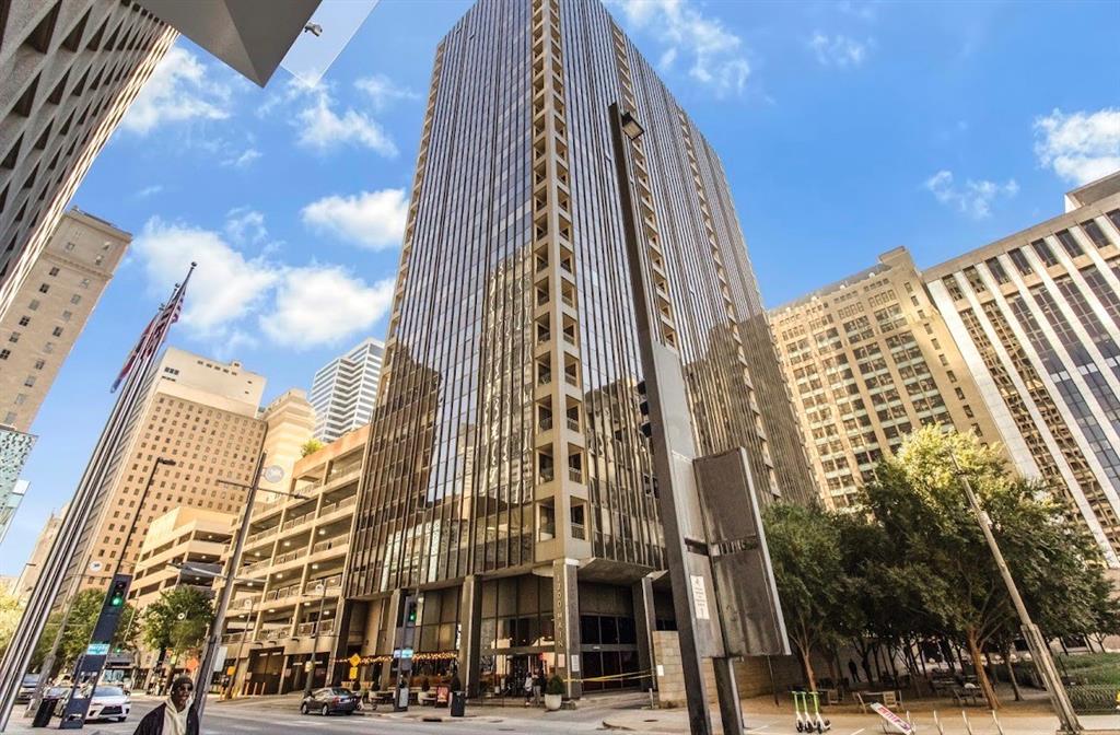 1200 Main Street, Unit 1404 Dallas, TX 75202 - Photo 2 of 27 a view of a large multi story building