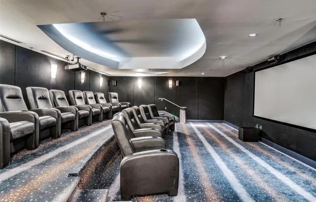 a view of a chairs and table in backyard of the house
