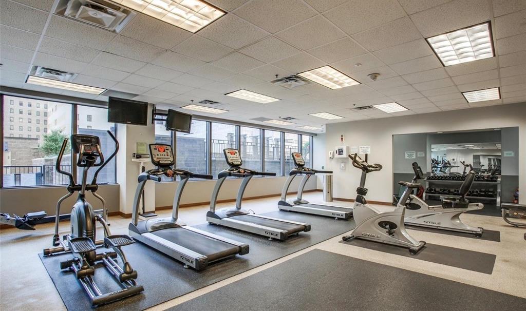 1200 Main Street, Unit 1404 Dallas, TX 75202 - Photo 21 of 27 a view of a room with gym equipment