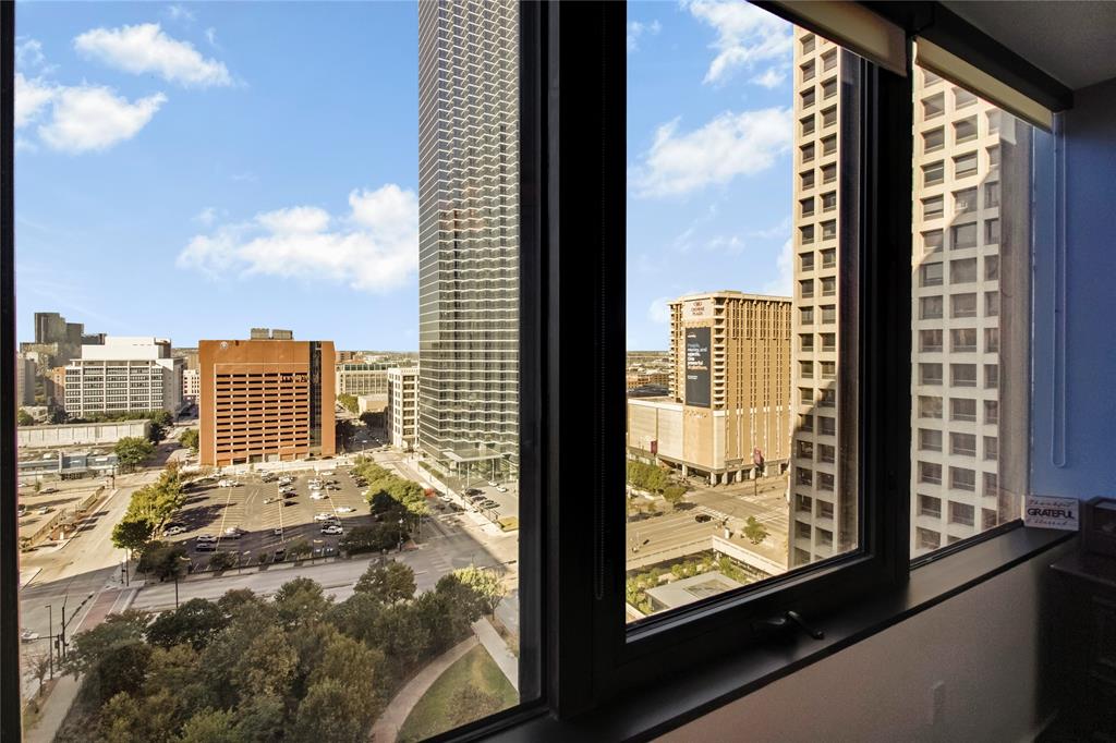 1200 Main Street, Unit 1404 Dallas, TX 75202 - Photo 5 of 26 a view of a balcony with a floor to ceiling window