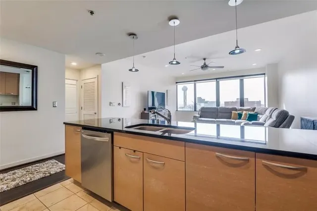 a view of a lobby with a couch and chairs