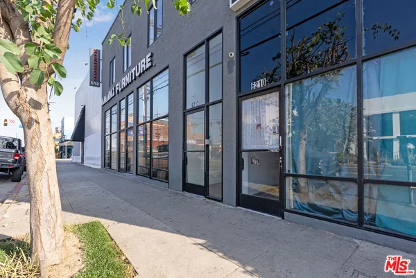 a picture of a wall with a white wall and white cabinet