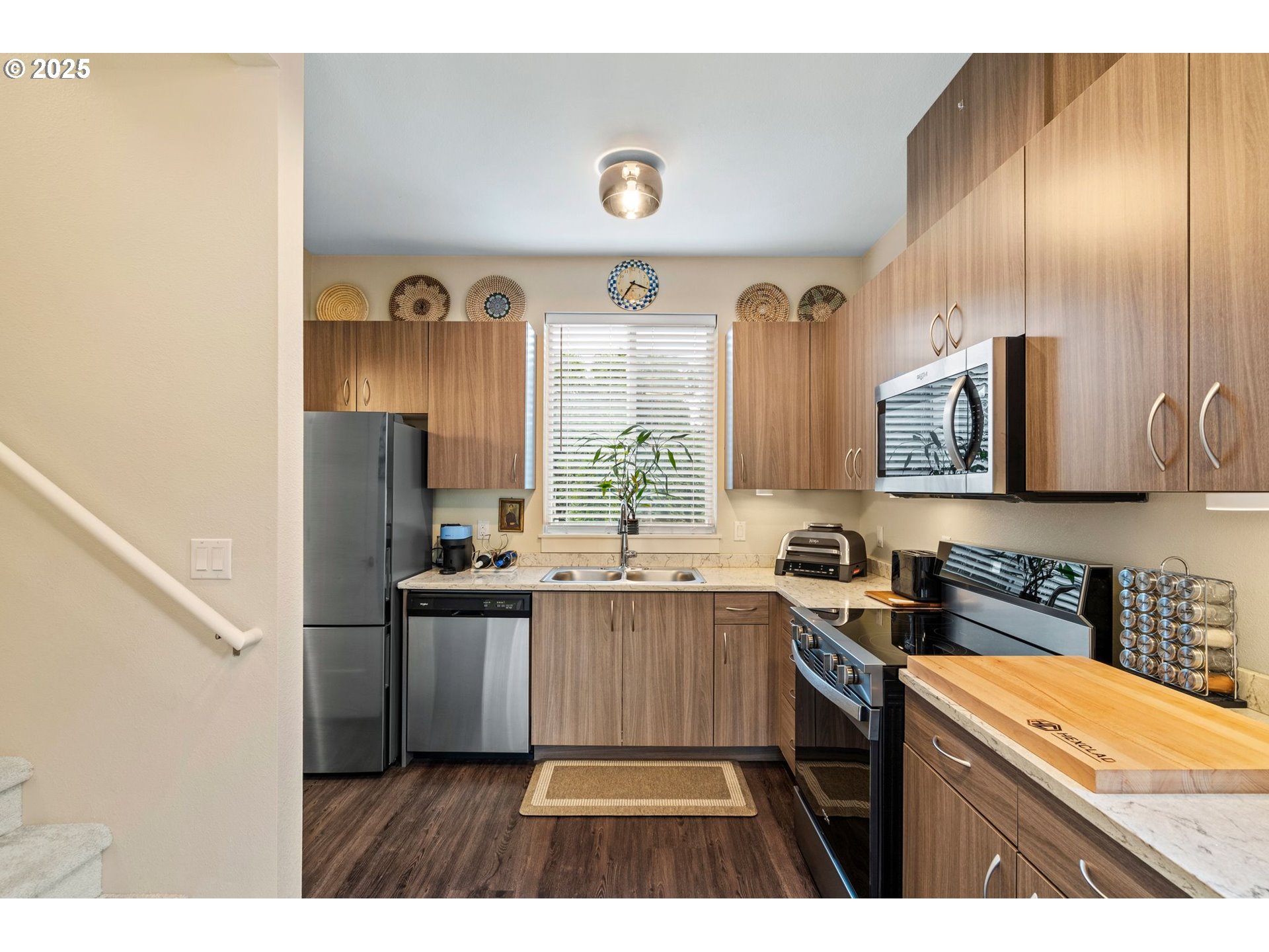 116 Northeast 109th Avenue, Unit A5 Portland, OR 97220 - Photo 15 of 46 a kitchen with stainless steel appliances granite countertop a sink stove and refrigerator