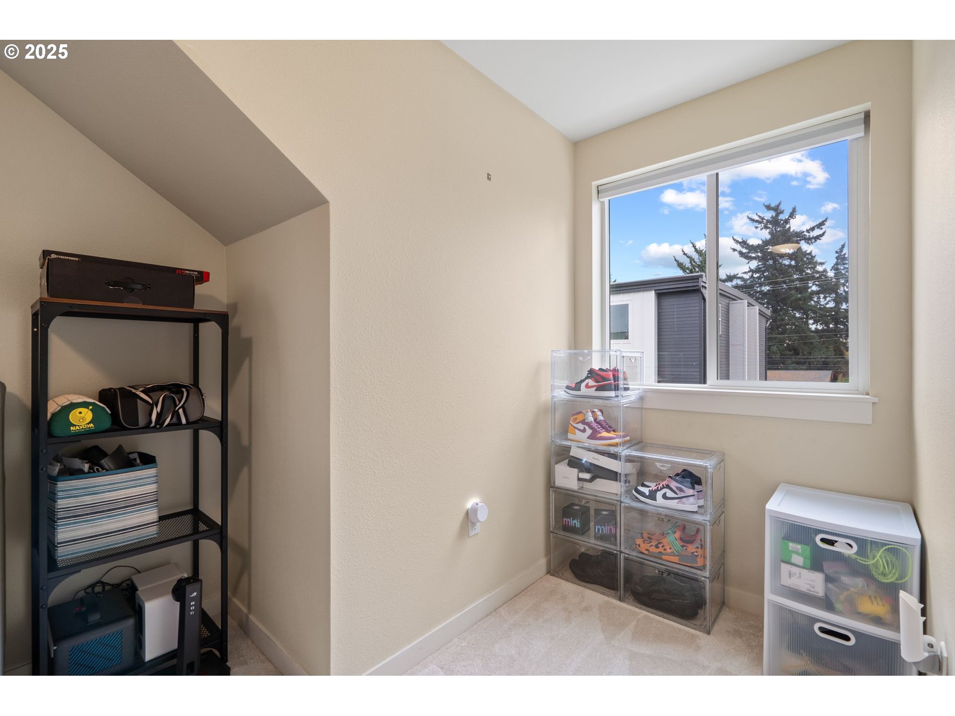 116 Northeast 109th Avenue, Unit A5 Portland, OR 97220 - Photo 41 of 46 a balcony with furniture and a potted plant