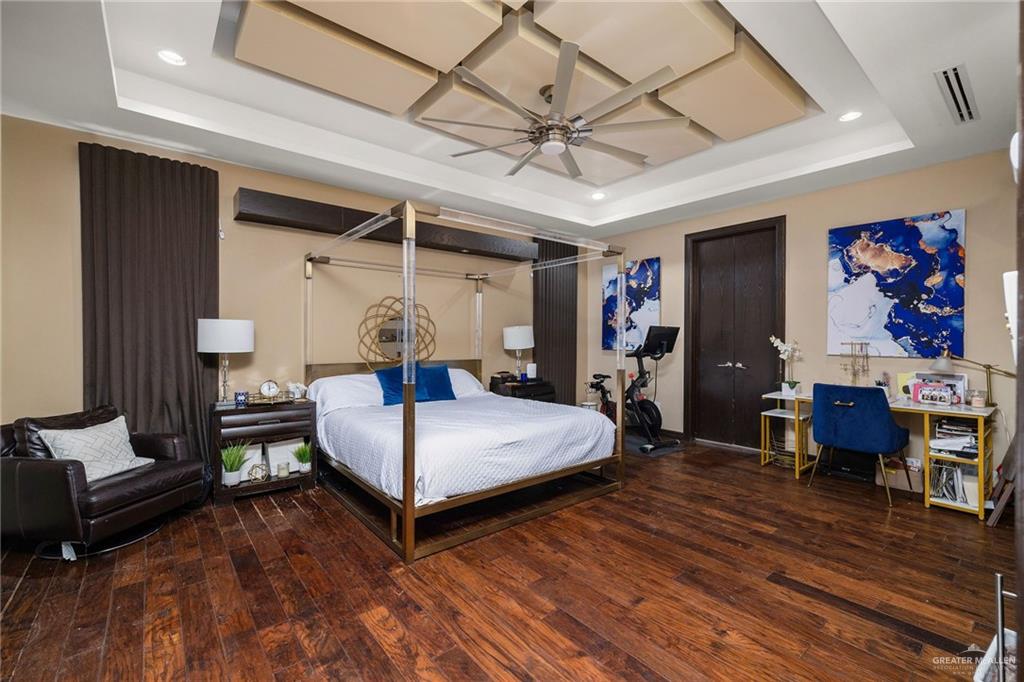 3011 Rio San Juan Street Rio Grande City, TX 78582 - Photo 12 of 31 a bedroom with furniture and wooden floor