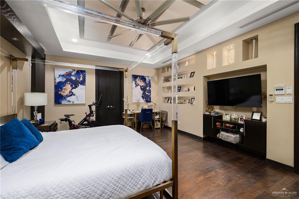 3011 Rio San Juan Street Rio Grande City, TX 78582 - Photo 13 of 31 a bed room with a bed a television and a large window