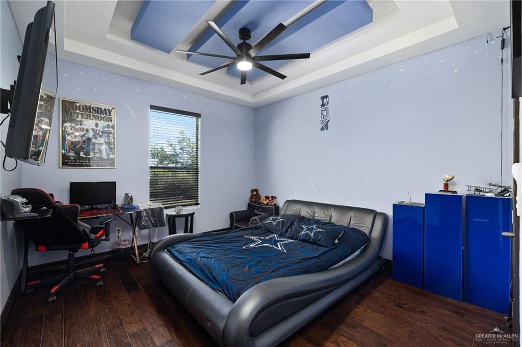 3011 Rio San Juan Street Rio Grande City, TX 78582 - Photo 17 of 31 a bed room with a bed and a television