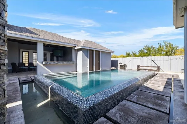 swimming pool view with sitting space