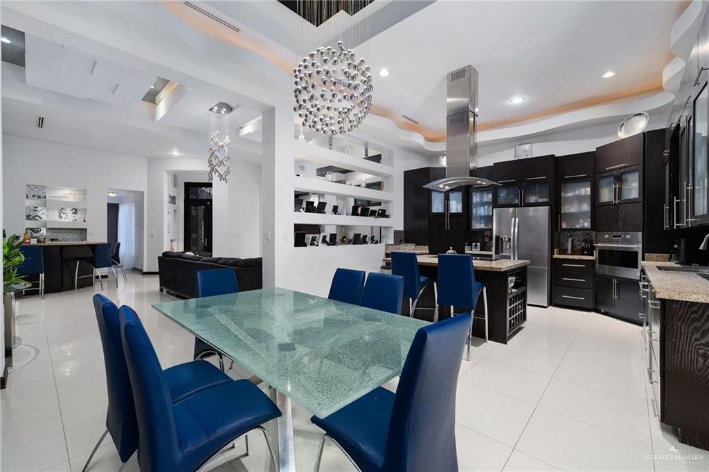3011 Rio San Juan Street Rio Grande City, TX 78582 - Photo 5 of 31 a view of a dining room with furniture