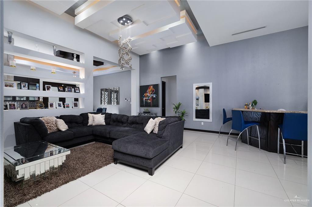 3011 Rio San Juan Street Rio Grande City, TX 78582 - Photo 9 of 31 a living room with furniture and wooden floor