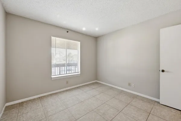 a bathroom with a sink toilet and mirror