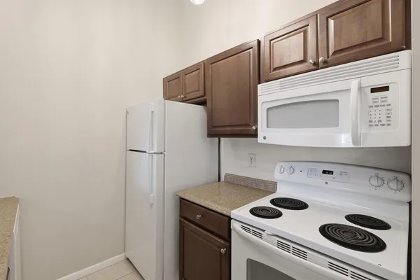 an empty room with a empty space and window