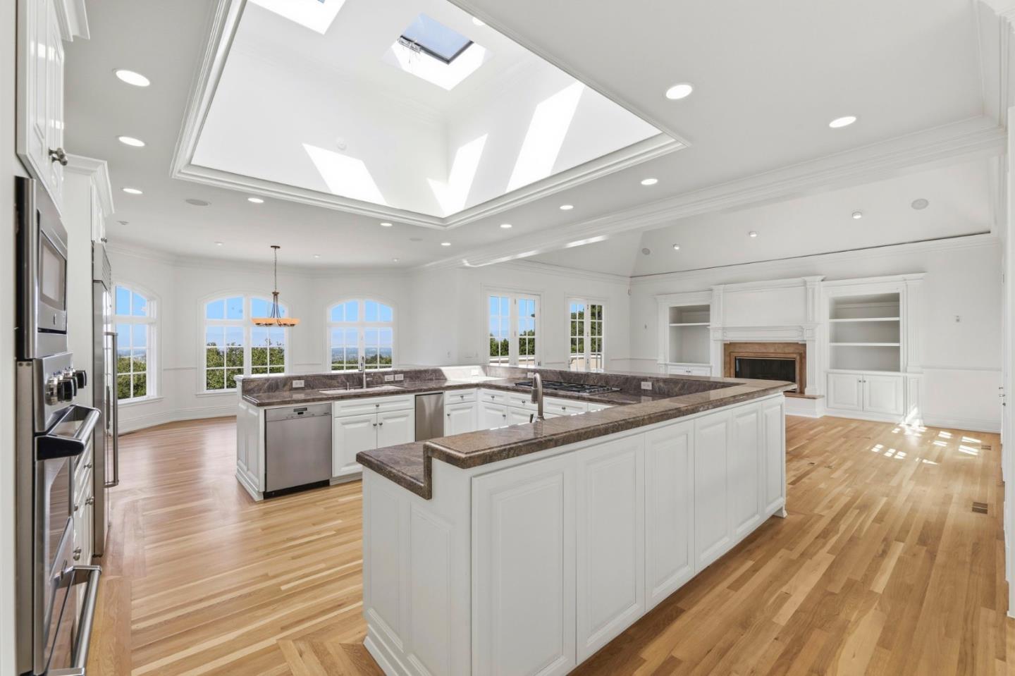 14113 Pike Road Saratoga, CA 95070 - Photo 20 of 78 a large kitchen with stainless steel appliances lots of counter top space