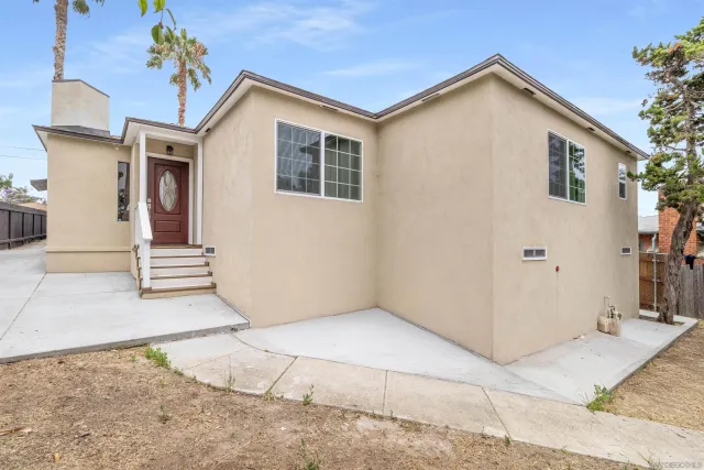 a front view of a house with a garage