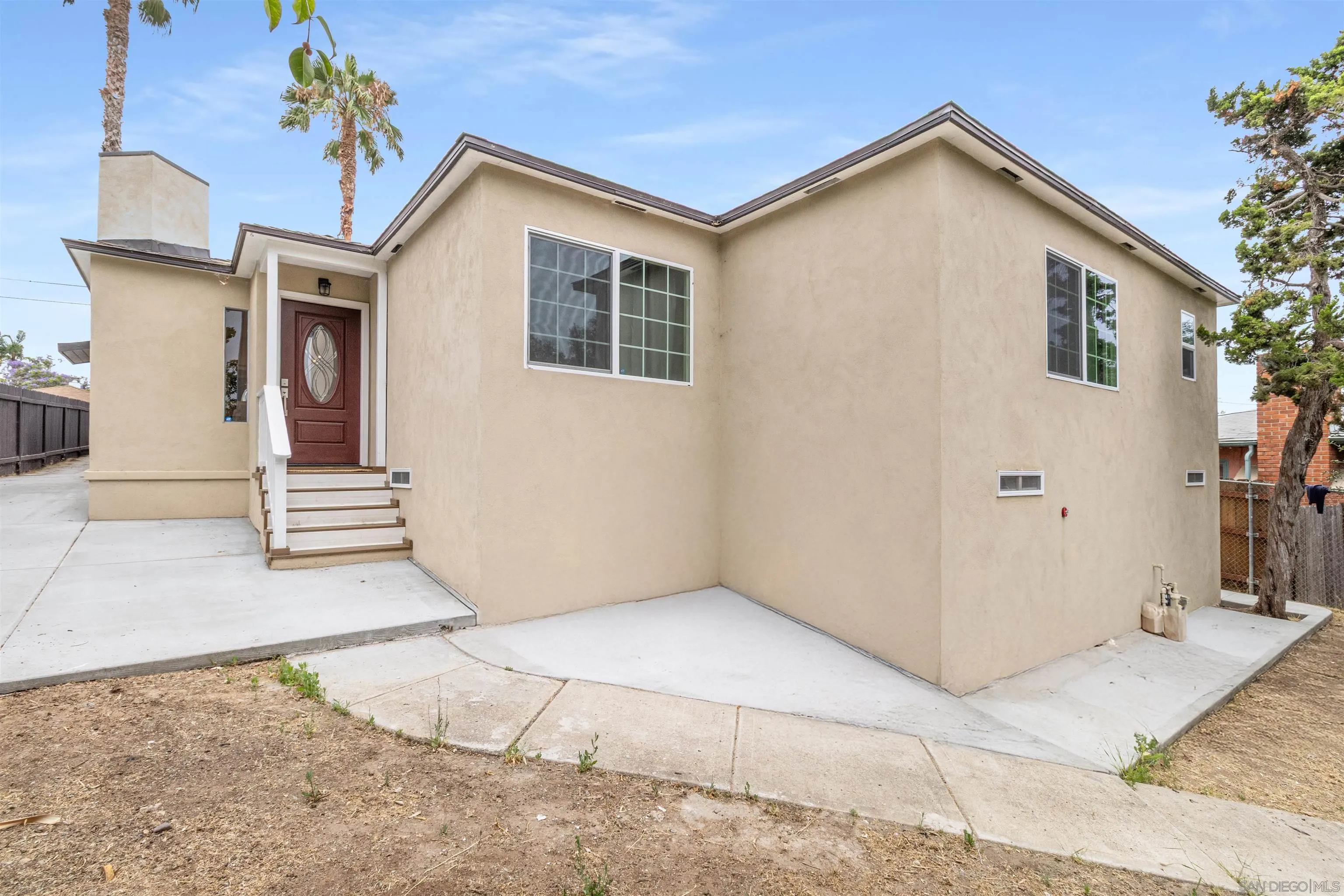 a front view of a house with a garage