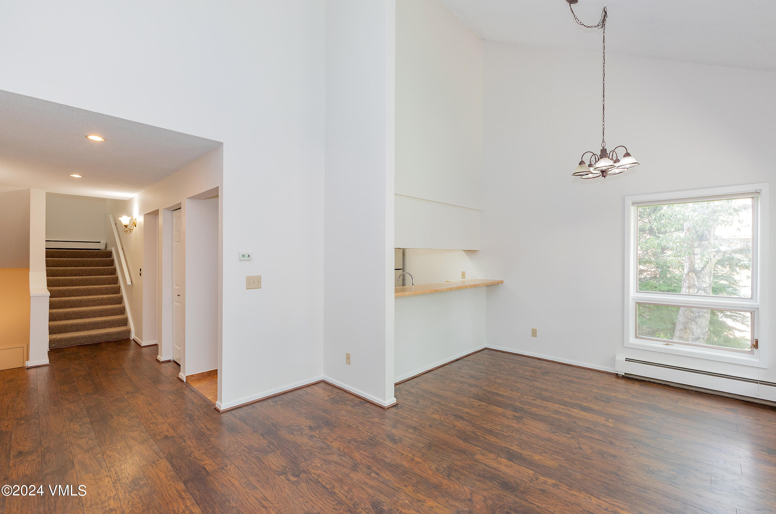 264 Eagle Drive, Unit 206 Eagle-Vail, CO 81620 - Photo 11 of 12 a view of a room with wooden floor and window