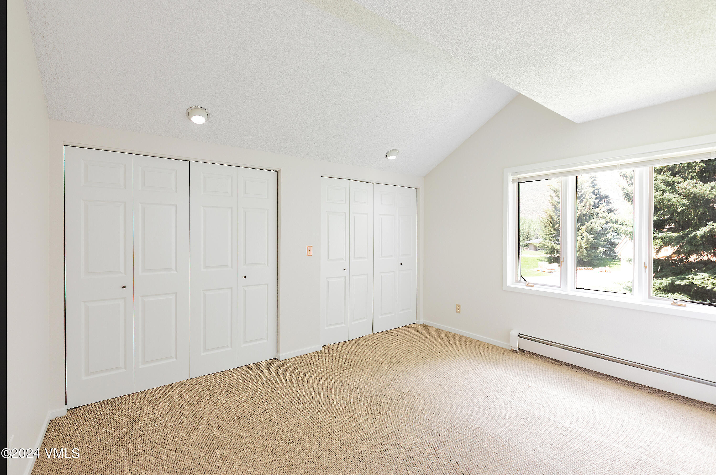 264 Eagle Drive, Unit 206 Eagle-Vail, CO 81620 - Photo 8 of 12 a view of an empty room with a window